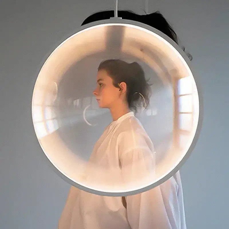 A sleek circular DecorBites led glass pendant light with translucent dome and metallic frame for hall or living room