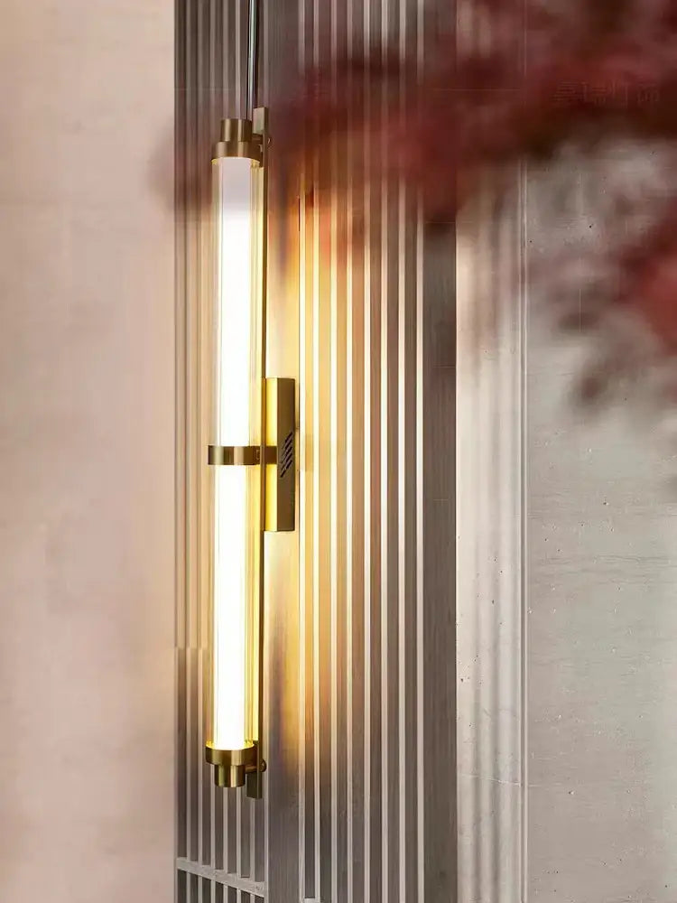 Modern brass-finished decorbites led glass wall lamp with cylindrical led glass wall light for living room and café lighting