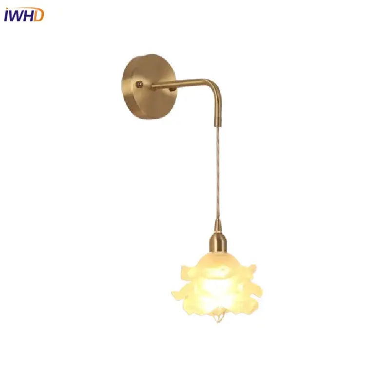 Gold-toned decorbites led glass wall lamp with curved arm and illuminated translucent flower-shaped glass shade for modern decor