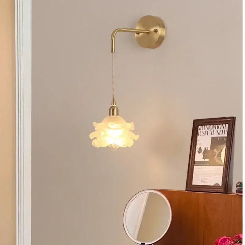 DecorBites™ LED glass wall lamp with a delicate brass sconce and frosted glass flower shade for modern home decor