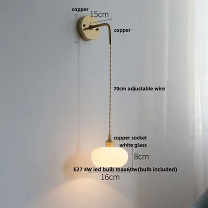 Copper wall light with white glass globe and adjustable wire from DecorBites LED glass wall light fixture collection