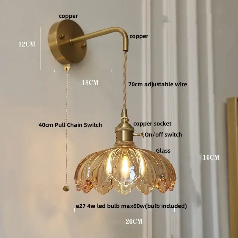 Antique brass decorbites led glass wall light with amber petal glass shade and adjustable copper wire arm for bedside use