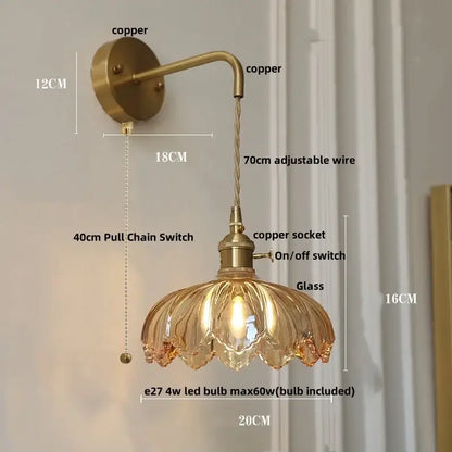 Antique brass decorbites led glass wall light with amber petal glass shade and adjustable copper wire arm for bedside use