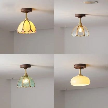 Four vintage style decorbites led glass wood ceiling lamps with wooden bases brass stems and yellow clear green or white shades
