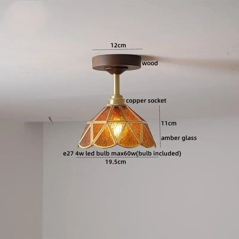 Vintage-style ceiling lamp with dark wood base brass copper stem and amber stained glass shade by decorbites led glass wood