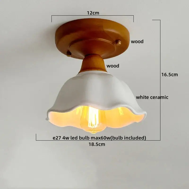 A warm-toned decorbites led glass wood ceiling light with white ceramic shade and wooden base for living room