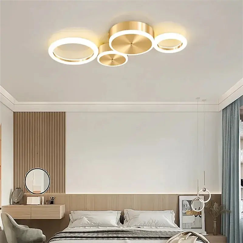 Modern gold-toned circular ceiling light fixture with sleek minimalist design decorbites led gold ring chandelier