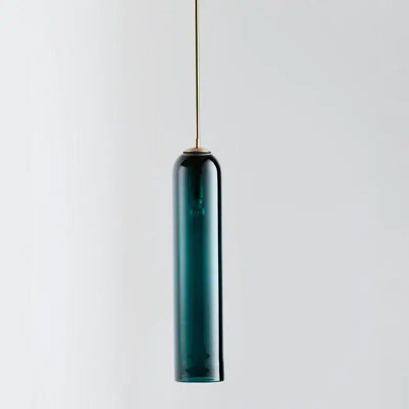 A sleek teal glass pendant light with brass-finished rod from decorbites led green series for kitchen bar decor