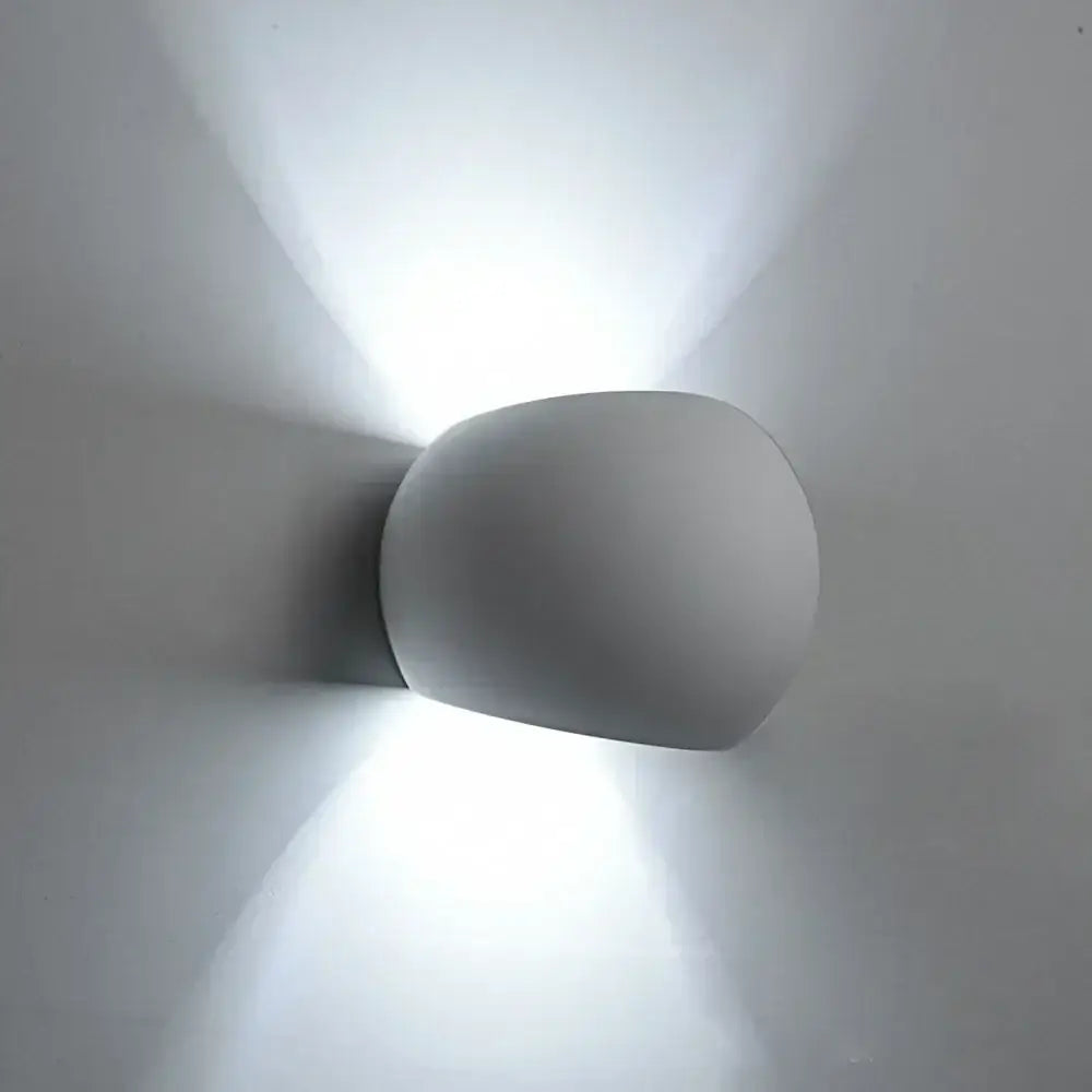 Modern matte white decorbites led gypsum wall sconce with sleek rounded design for bedroom living room kitchen decor