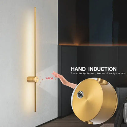 Gold-colored minimalist decorbites led hand induction wall light with sleek vertical bar and circular base for corridors and bedrooms
