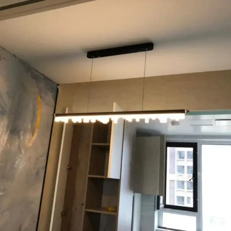 Modern black rectangular DecorBites LED hanging pendant lights with sleek minimalist design and evenly spaced LED bulbs