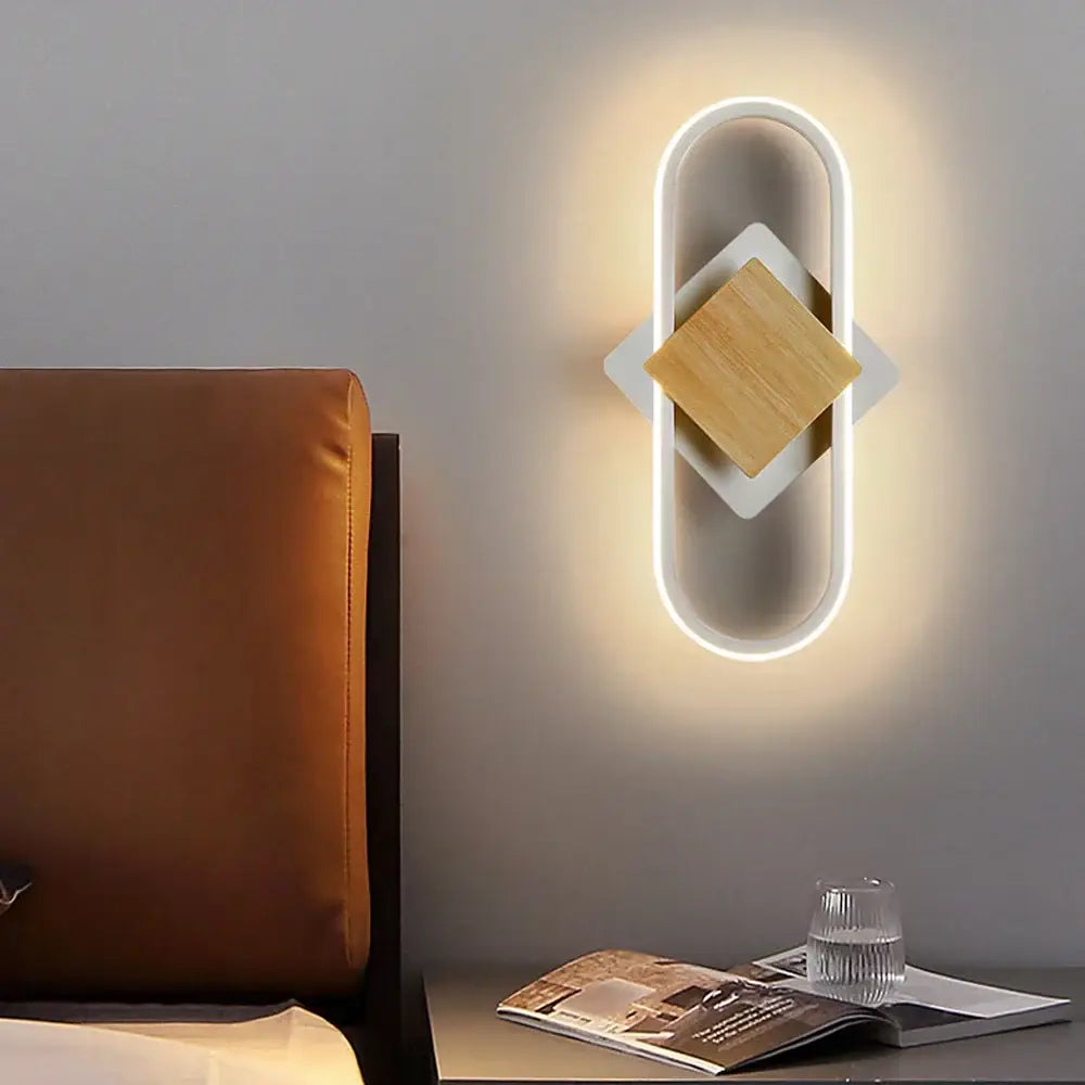 Modern minimalist decorbites led indoor wall light with sleek white frame wooden accent and warm ambient lighting
