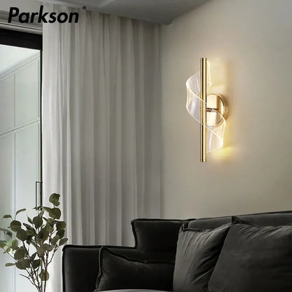 Gold-toned decorbites led wall sconce light with sleek twisted mesh design for warm indoor living room decor