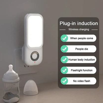 White rectangular DecorBites LED induction night light with circular button and wireless charging capability