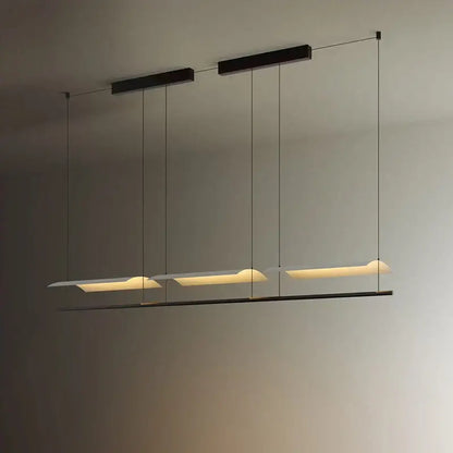 Modern black DecorBites led iron art chandelier with three elongated rectangular panels emitting warm ambient glow