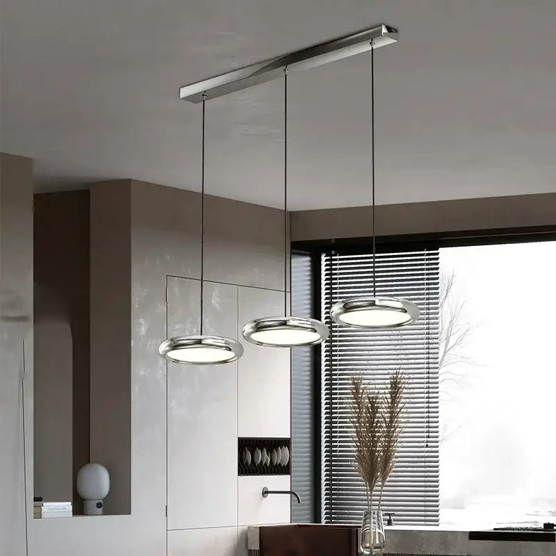 Modern chrome-finished decorbites led iron pendant light with sleek circular shades for home decor and lighting