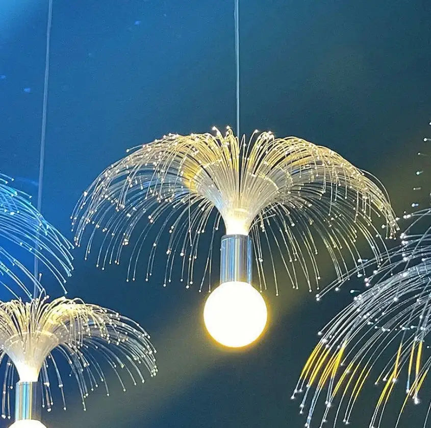 Golden fiber optic jellyfish lights with sleek metallic base and glowing spherical bulb by decorbites led jellyfish