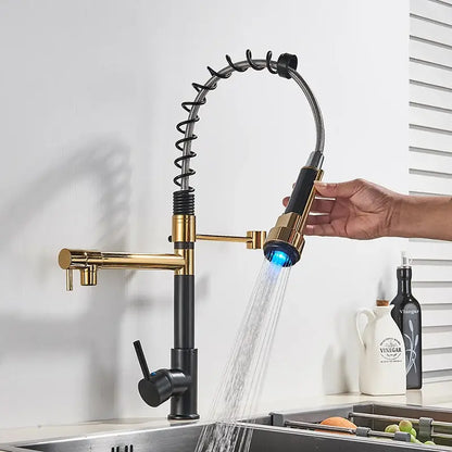 Gold and black decorbites led kitchen faucet with flexible coiled hose and illuminated blue spray head for vessel sink
