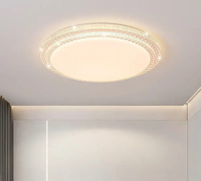 Circular ceiling light with warm glow and crystal-encrusted rim by DecorBites led luxury for modern living room decor