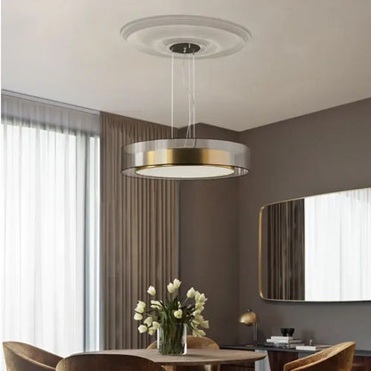Modern circular DecorBites LED luxury chandelier with gold and clear glass design for minimalist master bedroom decor