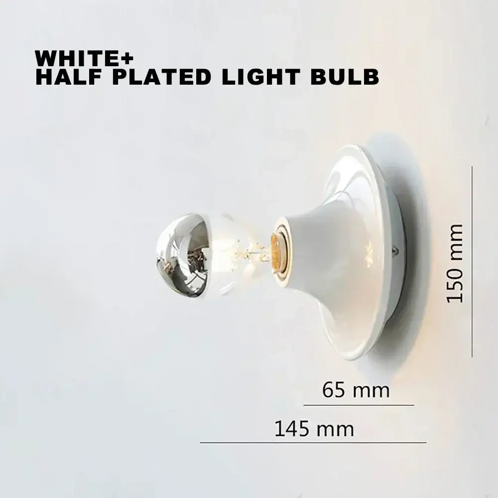 White half-plated light bulb with reflective metallic dome and clear glass in a decorbites led macaron wall lamp ceramic base