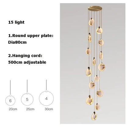 Modern pendant marble gold chandelier with 15 warm LED glass orbs suspended from gold circular plate decorbites led marble