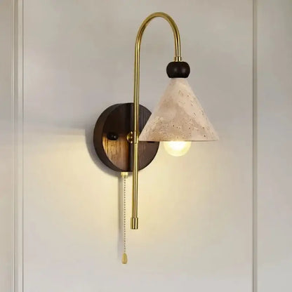 Gold-toned decorbites led marble wall light with textured off-white shade and dark wood backplate for bedroom use