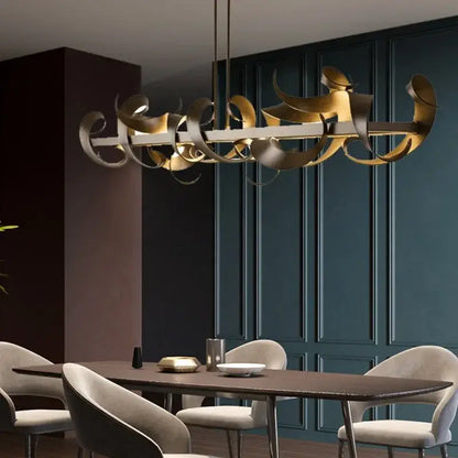 Gold-toned decorbites led metal pendant lights with flowing metallic curves for elegant modern dining room decoration