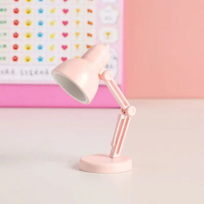 Pastel pink decorbites led mini desk lamp with adjustable matte plastic body and articulated arm for bedroom night light