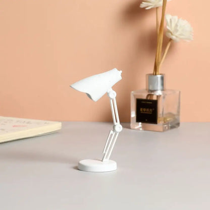 White decorbites led mini desk lamp with articulated arms foldable design and magnetic base for study and bedroom night light