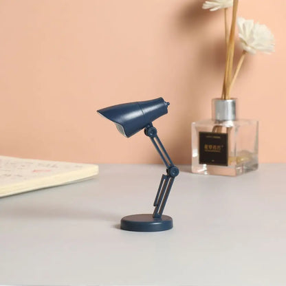 Navy blue decorbites led mini desk lamp with articulated arm magnetic base foldable design for study and bedroom night light