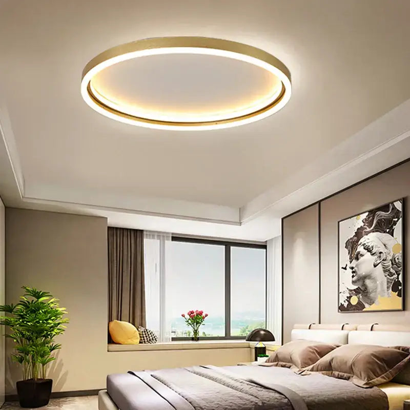 Modern circular decorbites led minimalist chandelier with golden finish and warm white led ilumination for living room