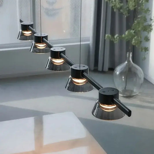 Modern black and chrome DecorBites LED minimalist pendant lights with five conical heads for kitchen island lighting
