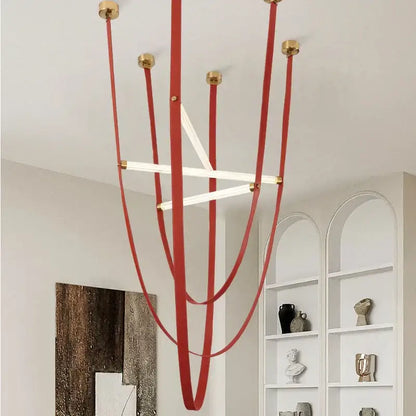 Red leather strap pendant lamp with brass hardware and integrated LED tubes from DecorBites LED minimalist chandelier series