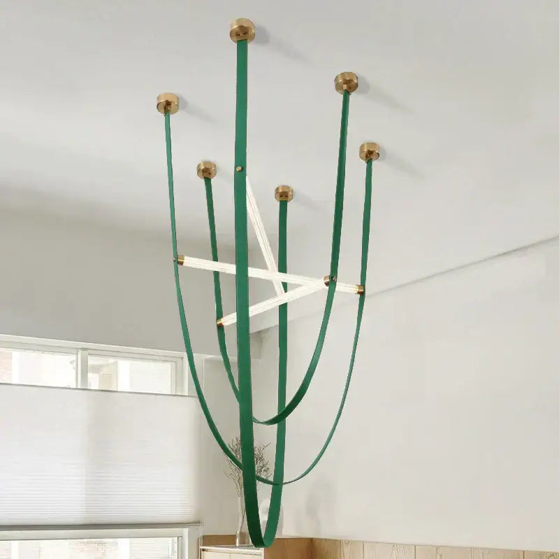 Emerald green leather strap pendant lamp with brass accents and white LED light bars by DecorBites LED minimalist chandelier