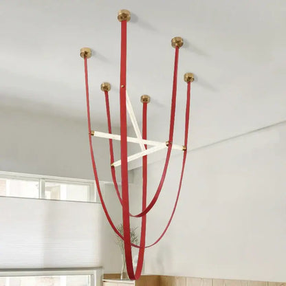 DecorBites LED minimalist pendant lamp with red leather straps brass fittings and white elements for modern living room decor