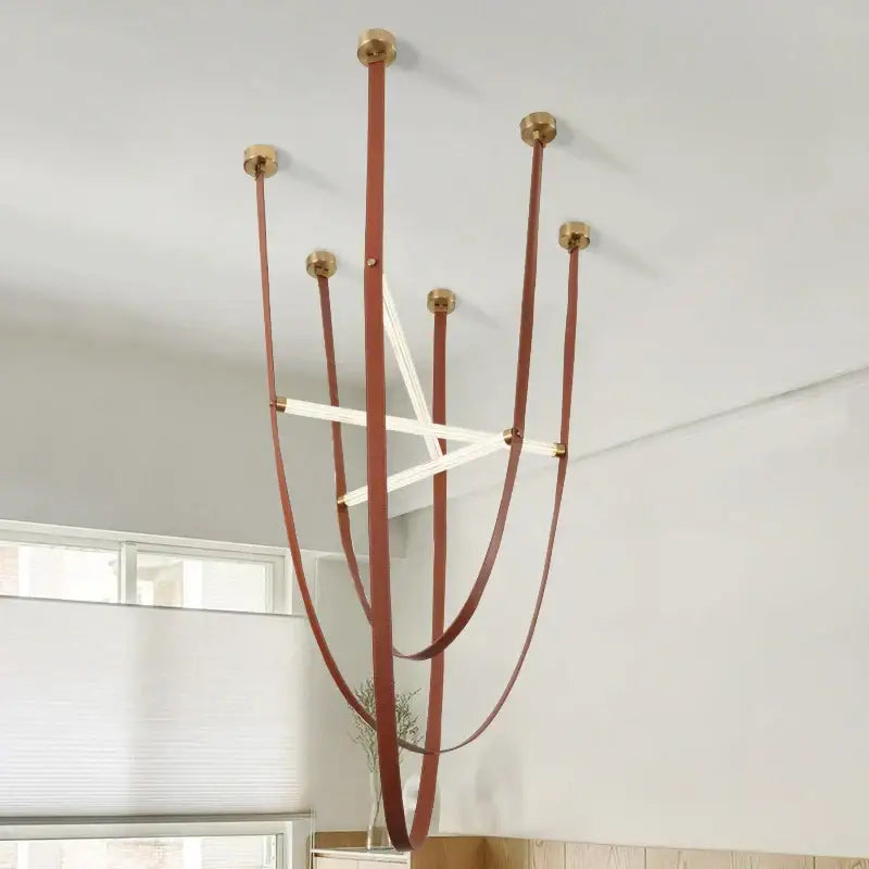 DecorBites™ LED minimalist chandelier pendant lamp with slender brown leather straps and polished brass fittings