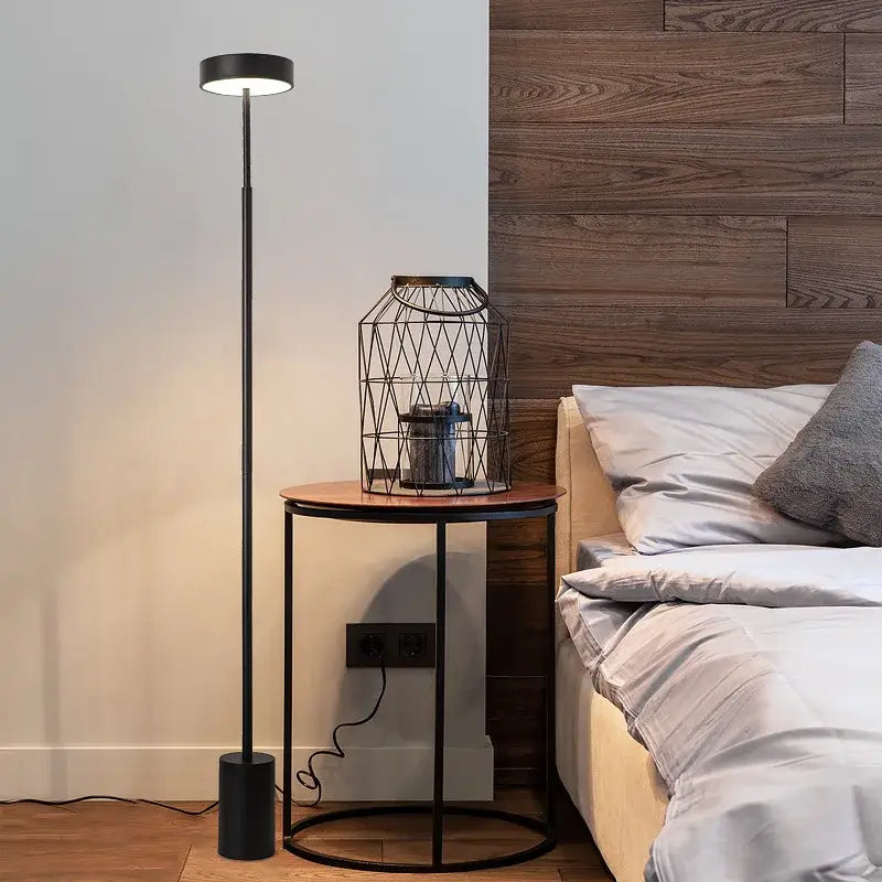 Black decorbites led minimalist floor lamp with cylindrical head and slender pole for living room and bedroom decor