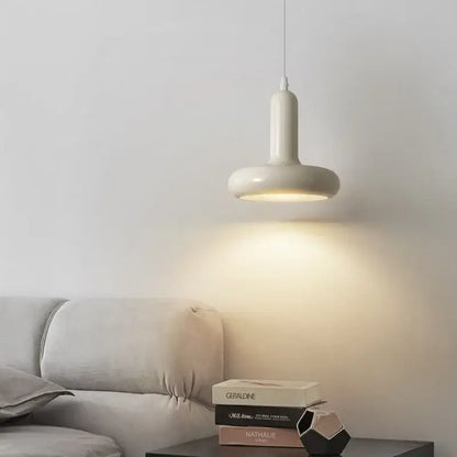 Cream-colored ceramic decorbites led minimalist pendant light with sleek modern design for living room and bedroom use