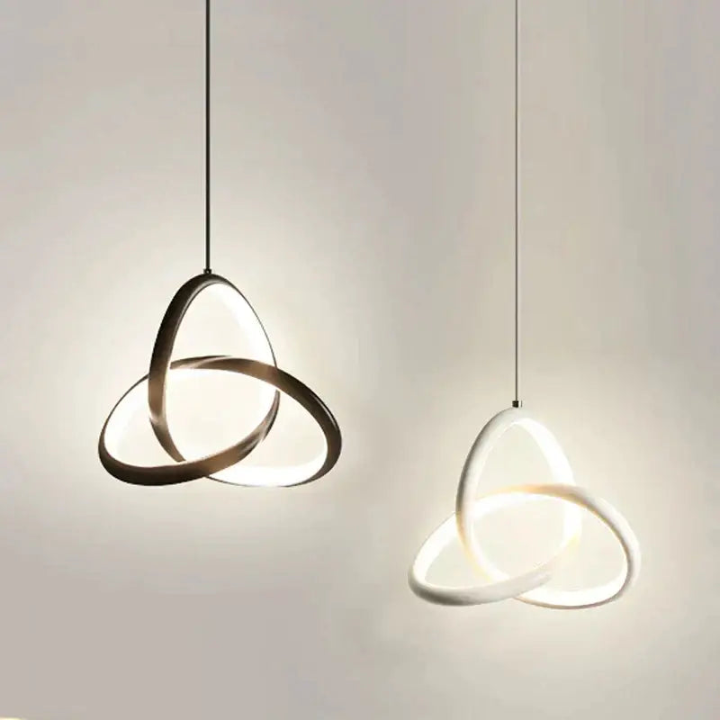 Decorbites led minimalist pendant light featuring interlocking brushed metal and white rings emitting soft glow for modern decor
