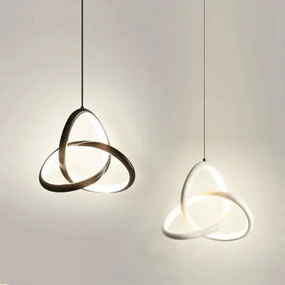Decorbites led minimalist pendant light featuring interlocking brushed metal and white rings emitting soft glow for modern decor