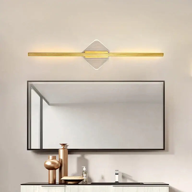 Gold-toned linear wall lamp with diamond-shaped ridged diffuser by DecorBites led mirror wall for minimalist decor
