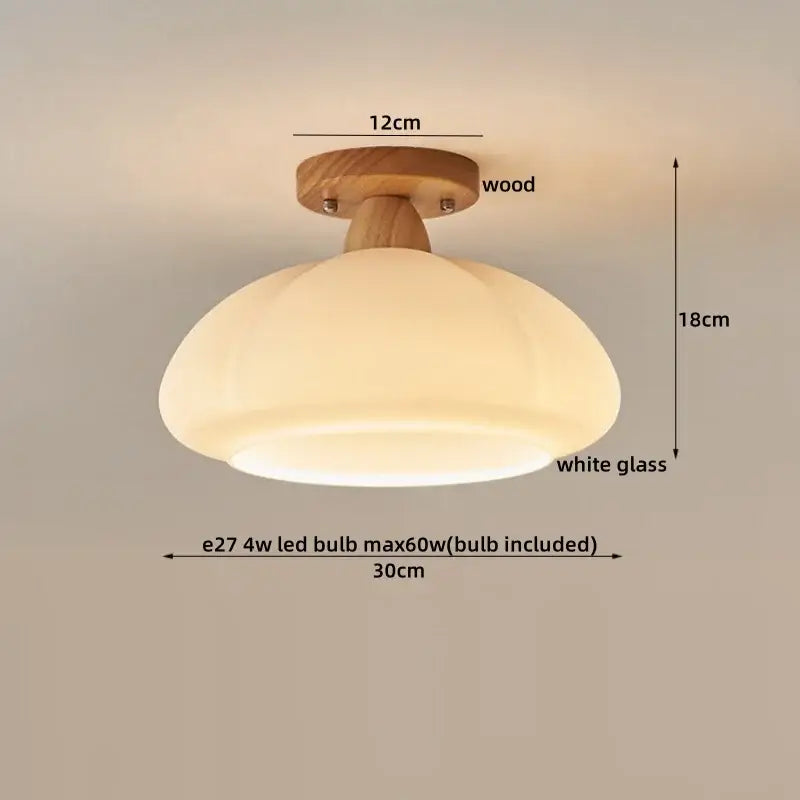 A warm decorbites led modern ceiling light with wooden base and white glass dome for living room and balcony lighting