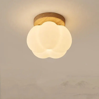 DecorBites led modern ceiling light with warm cloud shape frosted glass diffuser and natural wood base for living room