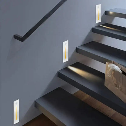 Modern minimalist decorbites led motion sensor wall lamps with white rectangular bodies and warm yellow led strips