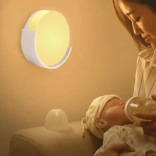 A modern decorbites led night light with a white plastic frame and warm yellow led light for bedroom use