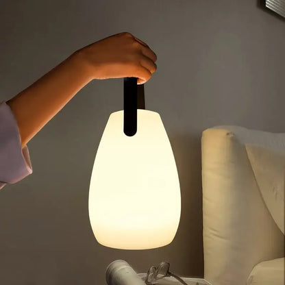 Decorbites™ led night light is a soft glowing white pendant lamp with sleek black handle portable for home and outdoors