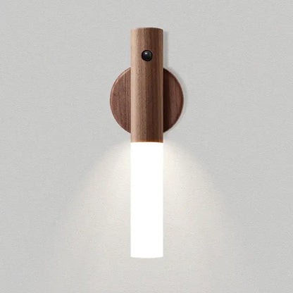Minimalist wooden DecorBites LED night light wall sconce with cylindrical tube emitting soft white illumination