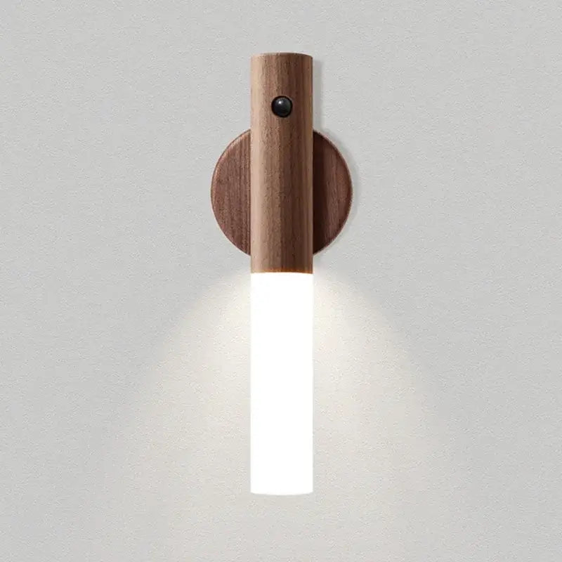 Minimalist wooden DecorBites LED night light wall sconce with cylindrical tube emitting soft white illumination