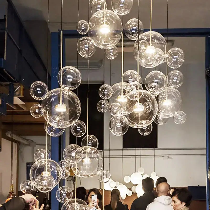 Clear glass decor led bubble chandelier with multiple spherical bulbs suspended by thin cords for nordic decor led lighting
